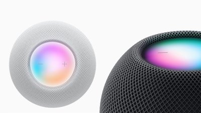 The HomePod mini in white and space grey with touch control panel 